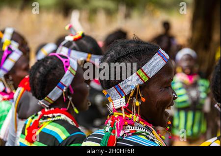 Traditional dressed young girls practising local dances, Laarim tribe, Boya hills, Eastern Equatoria, South Sudan Stock Photo