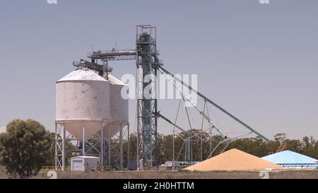 wheat silos and pile of harvested wheat near condoblin Stock Photo