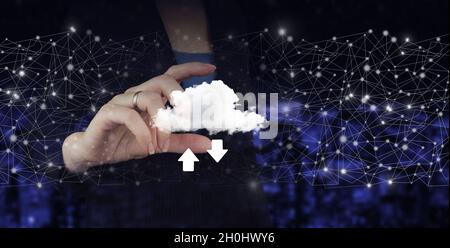 Download Data Storage Business Technology Network Concept. Hand hold digital hologram cloud, download, data sign on city dark blurred background Stock Photo