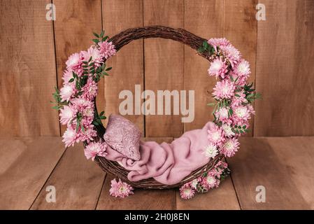 Newborn Digital Background Spring flowers Basket Prop for Newborn. For boys and girls. Wood back. shoot set up with prop bed and wood backdrop Stock Photo