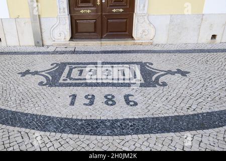 Traditional style Portuguese Calcada Pavement for pedestrian area in Lagos, Algarve, Portugal Stock Photo