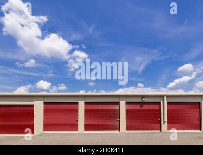Red doors at self storage facility, USA Stock Photo