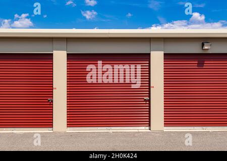 Red doors at self storage facility, USA Stock Photo