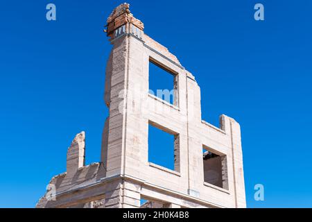 Deserted Ruined Bank Building in Rhyolite Ghost Town, Death Valley, Nevada, USA Stock Photo
