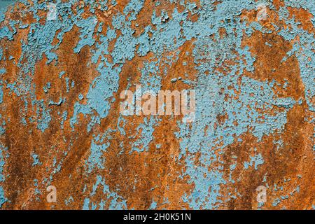 Rusty metal turquoise and red color texture background. Oxidated metal surface. Old vintage painted steel plate Stock Photo