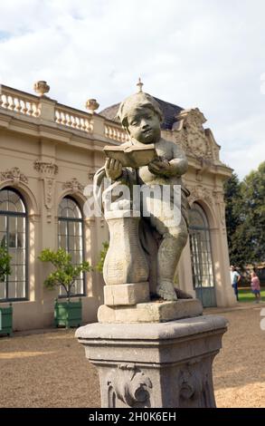 Wrest Park, Silsoe, Bedfordshire 2021. This Cherub sits outside the Orangery and has been designated a grade I listed building.  Open to the public it Stock Photo