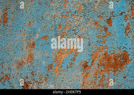 Rusty metal turquoise and red color texture background. Oxidated metal surface. Old vintage painted steel plate Stock Photo