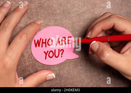 Handwriting text Who Are You Question. Word for asking about its identity or personal information Writing Important Notes Drawing New Design Composing Stock Photo