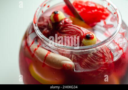 Punch prepared for Halloween party with decorative elements stylized as human organs, scary drink Stock Photo