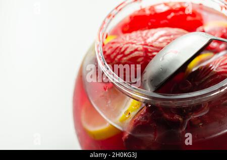 Punch prepared for Halloween party with decorative elements stylized as human organs, scary drink Stock Photo