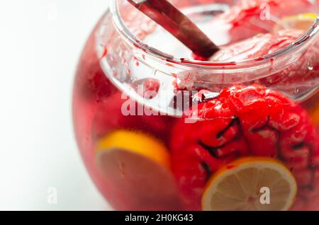 Punch prepared for Halloween party with decorative elements stylized as human organs, scary drink Stock Photo