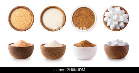 Heap of cane sugar, white and coconut sugar isolated on white  Top view. Brown and white sugar isolation in different angles. Natural sugar on wooden Stock Photo