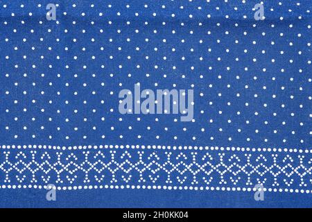 close up of a piece of fabric printed in blue dyeing process Stock Photo
