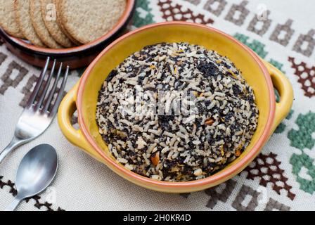 Kutia/Kutya - a traditional Christmas wheat berry pudding, popular in Poland, Ukraine, Russia and other East European countries. Stock Photo