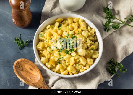 Healthy Homemade German Spaetzle Noodles with Butter and Parsley Stock Photo