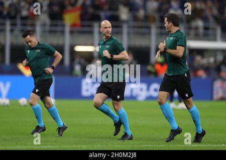 Milan, Italy, 10th October 2021. The referee Anthony Taylor of England ( centre ) with his assistants Gary Beswick ( left ) and Adam Nunn ( right ) during the warm up prior to the UEFA Nations League Final match at Stadio Giuseppe Meazza, Milan. Picture credit should read: Jonathan Moscrop / Sportimage Stock Photo