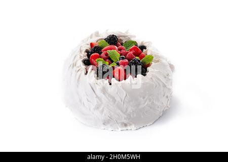Delicious Pavlova cake with meringue topped and fresh berries isolated on white background Stock Photo