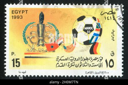 EGYPT - CIRCA 1993: stamp printed by Egypt, shows Soccer ball, Trophy, National flags, circa 1993 Stock Photo