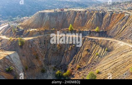 Drilling equipment for geological exploration of mining waste heaps. Abandoned copper mine area in Xyliatos, Cyprus Stock Photo