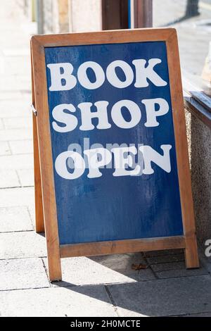 Book Shop Open sign outside independent bookshop - Innerleithen, Scotland, UK Stock Photo