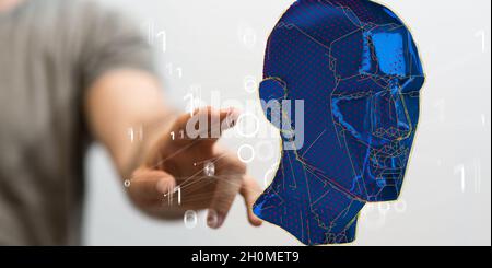 Hand touching rendered head Stock Photo