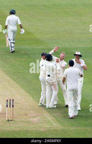 Pakistan captain Sarfaz Ahmed leaves the field as England’s Ben Stokes celebrates taking his wicket Stock Photo