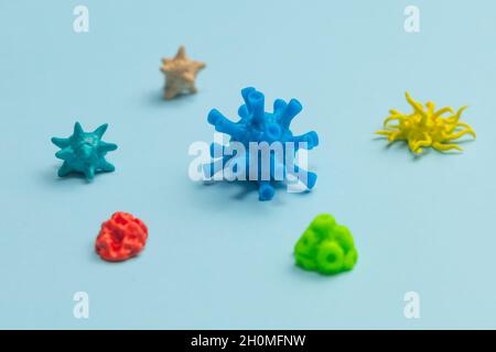 Different viruses and bacteria on a blue background. Stock Photo
