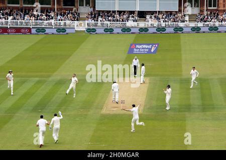 England’s Mark Wood celebrates taking the wicket of Pakistan’s Haris Sohali Stock Photo