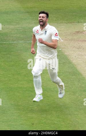 England’s Mark Wood celebrates taking the wicket of Pakistan’s Haris Sohali