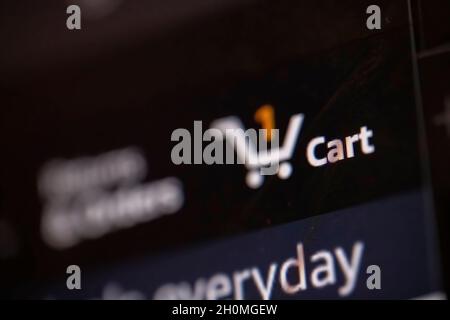 Calgary, Alberta, Canada. Oct 12, 2021. An Amazon shopping basket with an item to check out on the cart. Stock Photo