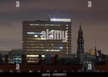 Pinnacle office building in Leeds & one of the towers of Leeds Kirkgate Market Stock Photo