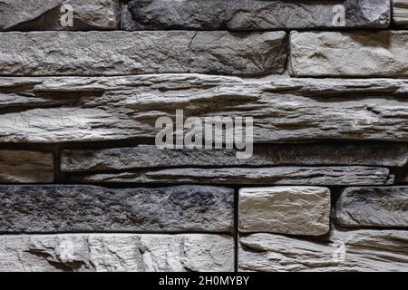 Close-up texture of a gray stone wall Stock Photo