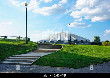 POZNAN, POLAND - Oct 18, 2015: Stone stairs and green grass leading to the Hala arena, Poznan, Poland Stock Photo