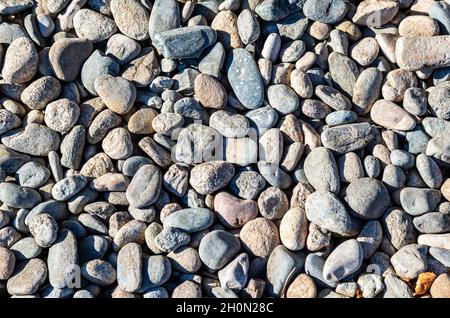 Gravel texture useful as a background. Texture of rubble construction material. Stones and gravel top view Stock Photo