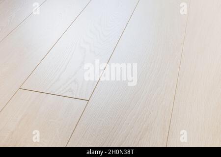 Minsk, Belarus - August 05, 2019: close up view of laminate floor Tarkett Woodstock white sherwood oak 4V in interior Stock Photo