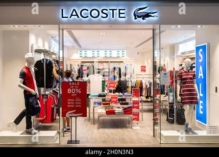Gør livet Anerkendelse Match French clothing brand Lacoste store and logo seen in Hong Kong's Tung Chung  district. (Photo by Budrul Chukrut / SOPA Images/Sipa USA Stock Photo -  Alamy