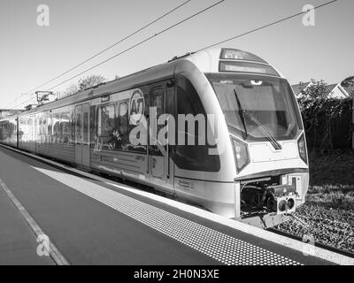 AUCKLAND, NEW ZEALAND - Jun 01, 2021: View of Auckland Transport Kiwirail CAF CxK electric train (EMU) at Remuera Station. Auckland, New Zealand - Jun Stock Photo