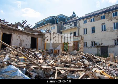 Ruined houses in Ganja city of Azerbaijan after the Armenian ballistic missile attack in October 2020. War results Stock Photo