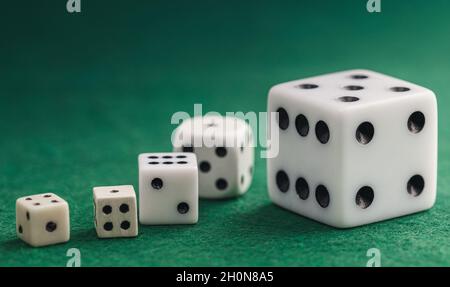 Colored board game figures with dice. Board games concept. Stock Photo