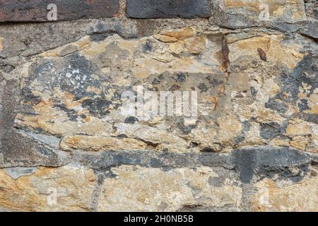 Old stone wall texture background. Close up. Stock Photo