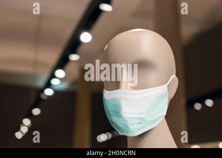 Head of a white mannequin in the store. Faceless girl. Stock Photo