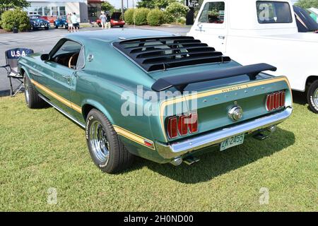 A 1969 Ford Mustang Mach 1 on display at a Car Show. Stock Photo