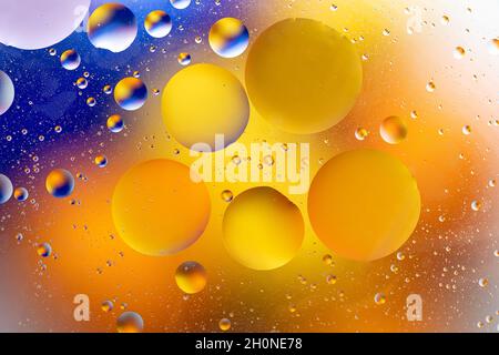 Colorful backdrop with oil drops on water surface. Abstract background. Stock Photo