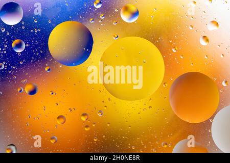 Colorful backdrop with oil drops on water surface. Abstract background. Stock Photo
