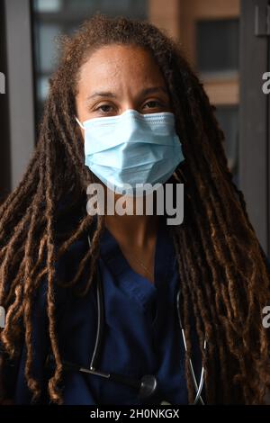 Female doctor with long dreads Stock Photo
