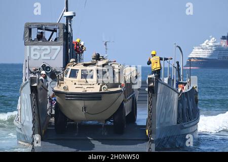 LANDING SHIP (DOCK) LOADS LANDING CRAFT (ROCKET). 13 DECEMBER 1944 ...