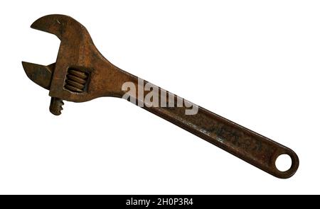 old rusty adjustable wrench lie on a white background close-up Stock Photo