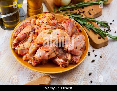 Chicken wings pickled for grilling Stock Photo