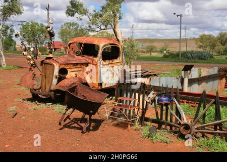 Red earth and discarded truck in old gold mining ghost town of Gwalia, Leonora, in the Great Victoria Desert, Western Australia Stock Photo