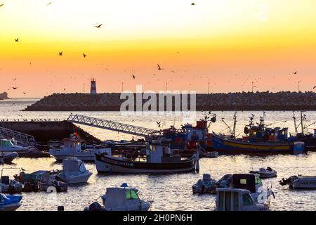 Portugal, Setubal Peninsula: Sesimbra Sunset over the harbour Stock Photo